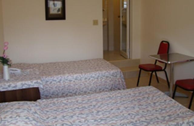 Micro Beach Hotel Garapan Bilik gambar