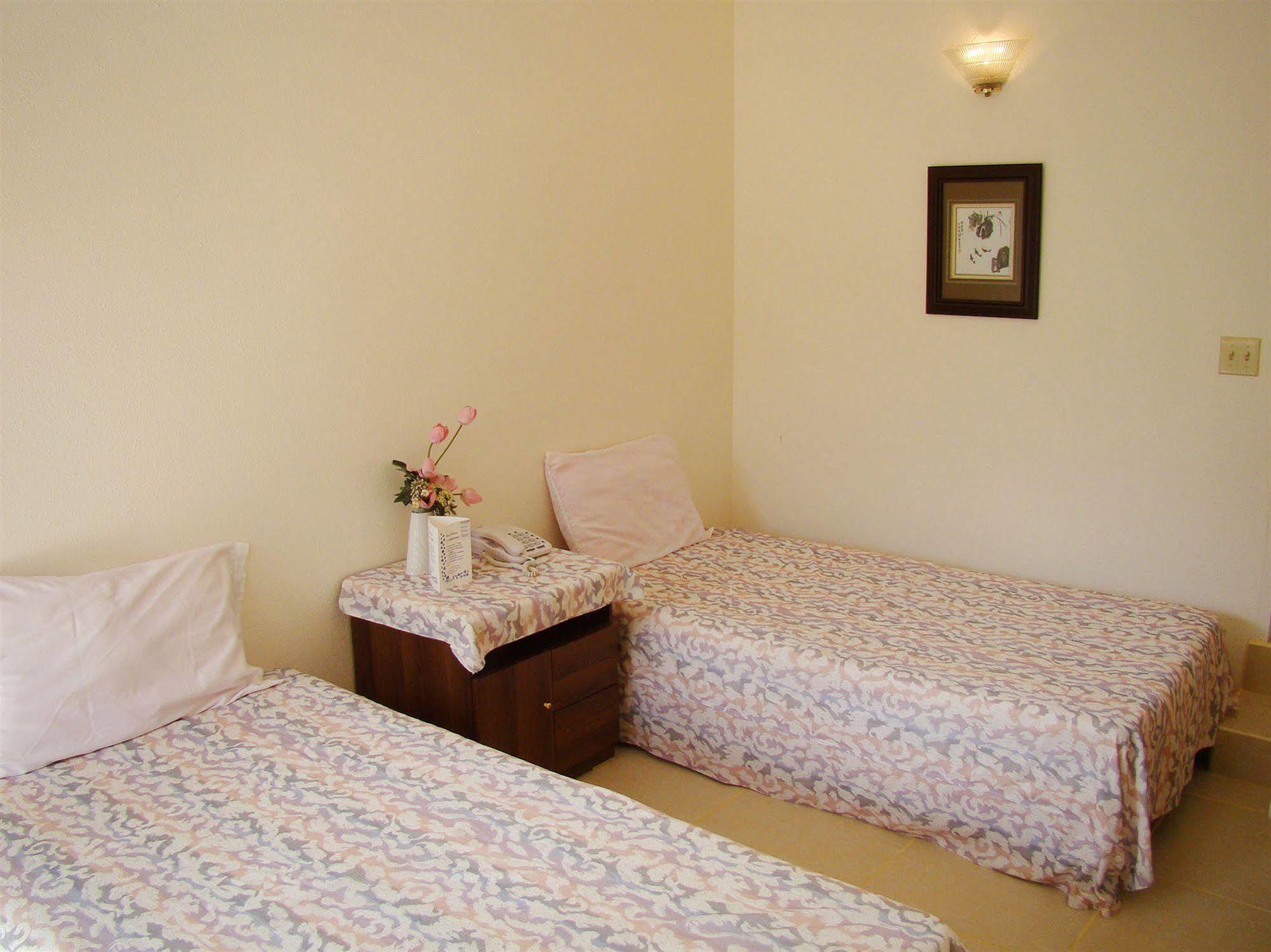 Micro Beach Hotel Garapan Luaran gambar